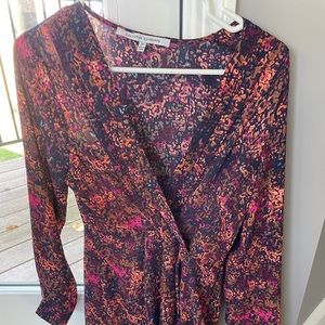 Small petite long sleeve Collective Concepts romper.